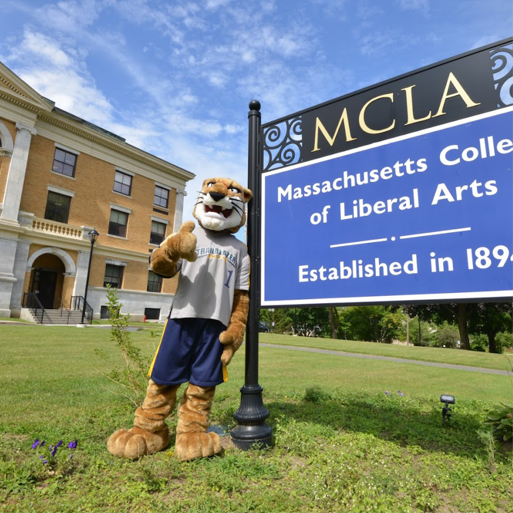 MCLA mascot in front of Murdock Hall
